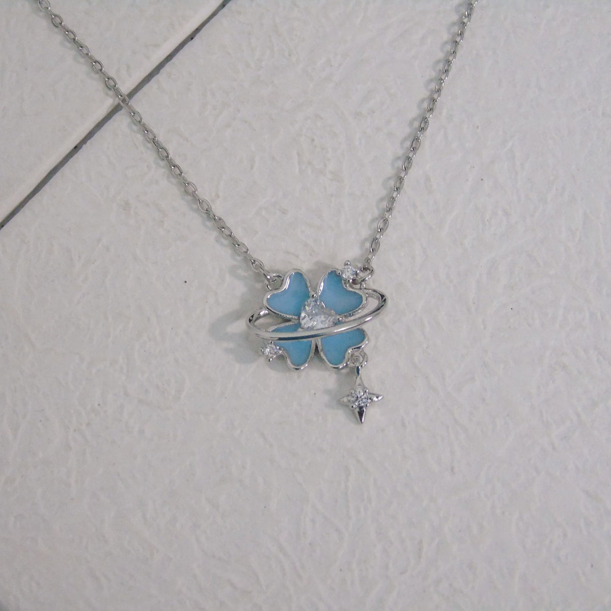 Fluorescent Starburst Four-Leaf Clover Necklace