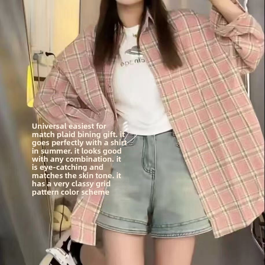 A woman in a blue checkered shirt