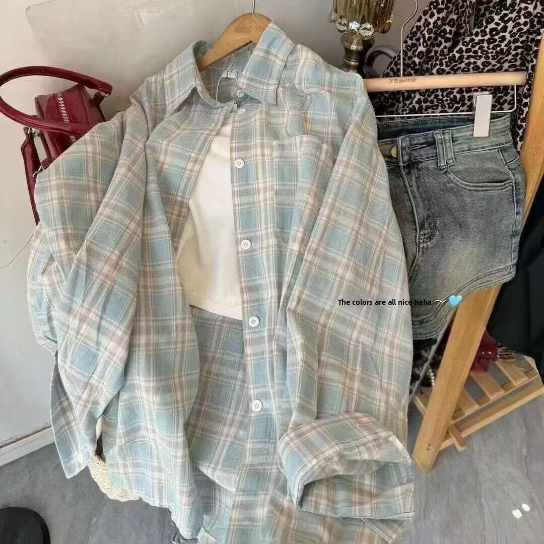 A woman in a blue checkered shirt