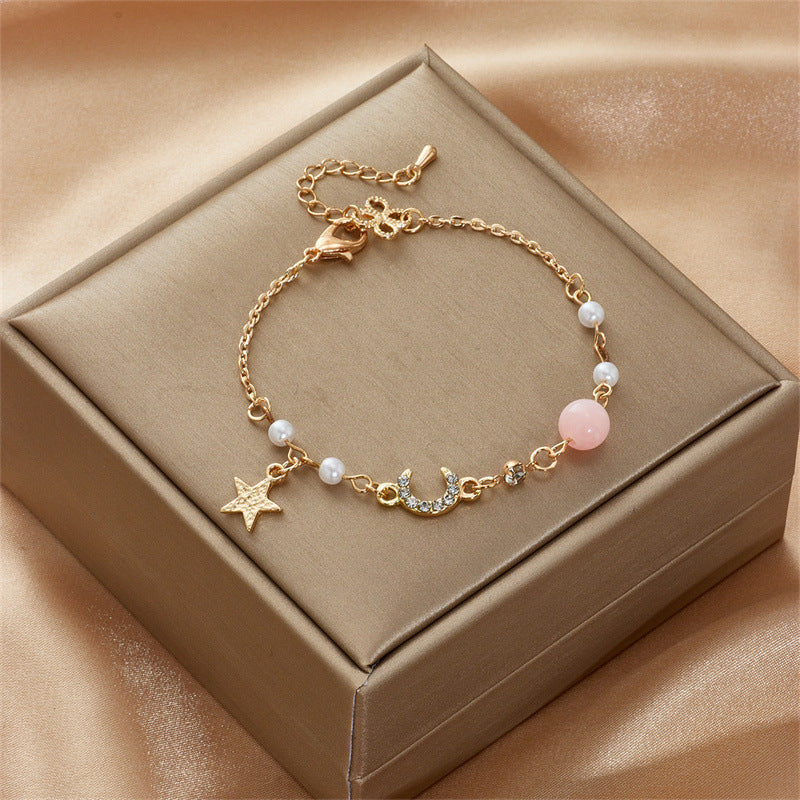 Celestial Charm Bracelet with Pearl Accents in Gold Tone