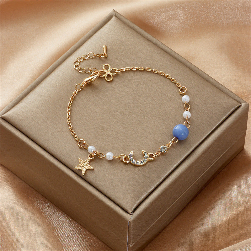 Celestial Charm Bracelet with Pearl Accents in Gold Tone