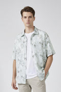 Light green floral patterned kimono-style shirt on a white background