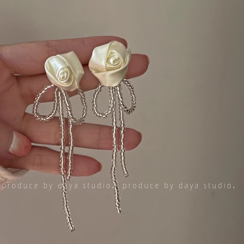 Lirio Charm Bow & Butterfly Earrings