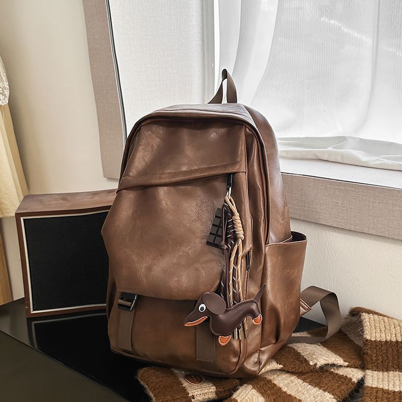 Leather Backpack with charm