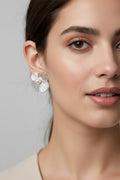 handcrafted pearl flower earrings with artistic retro charm