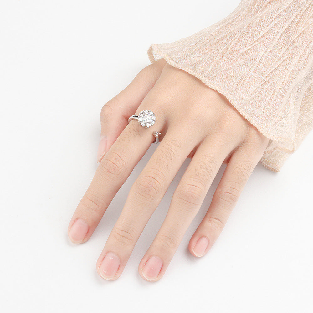 Rotating Floral Diamond Spinner Ring in Polished Gold Finish