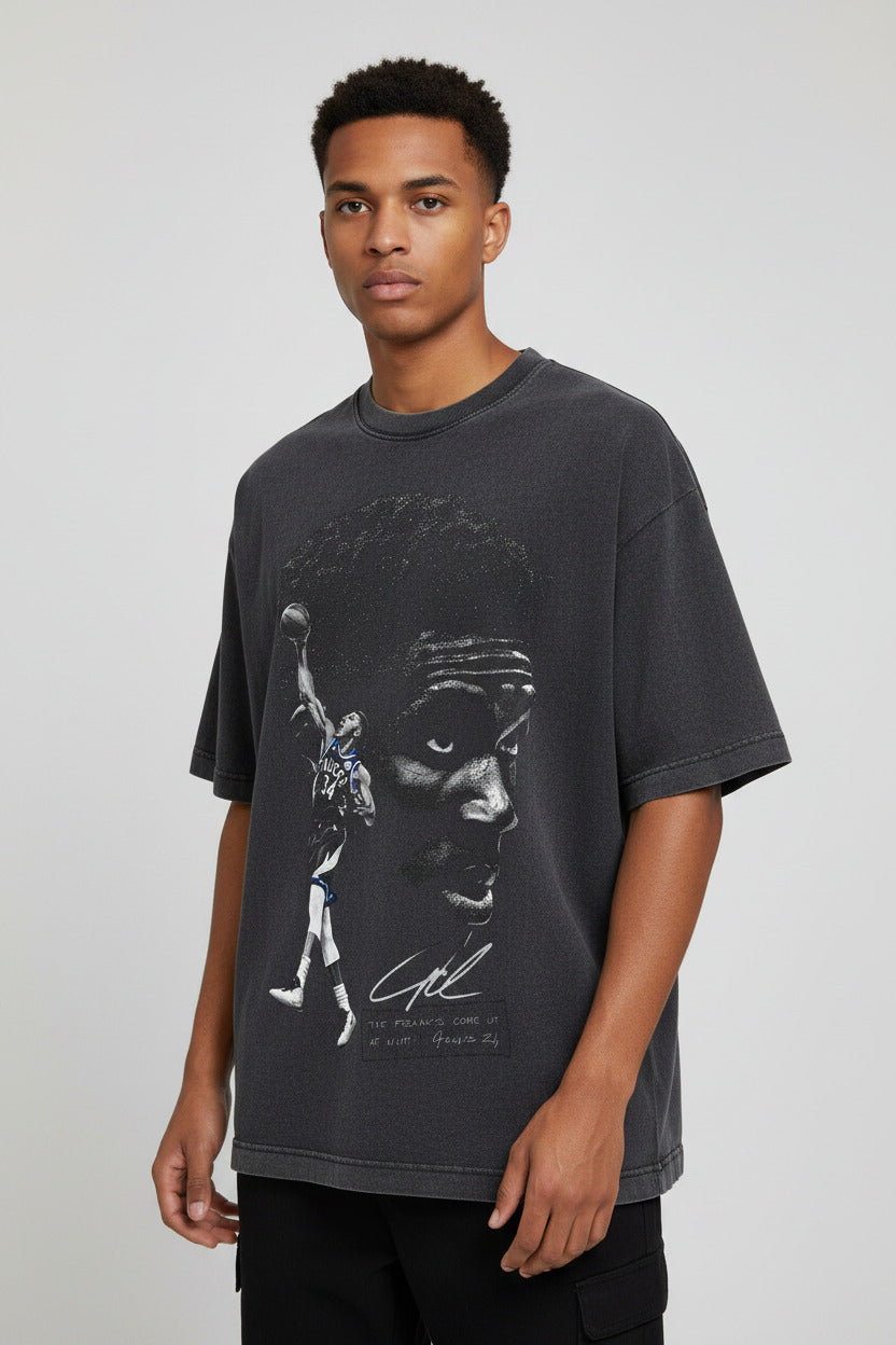 Black t-shirt with graphic design and text on a white background
