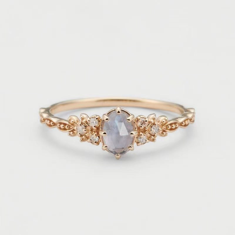 Cordierite Olive Leaf Ring with Zircon Accents in Gold Tone
