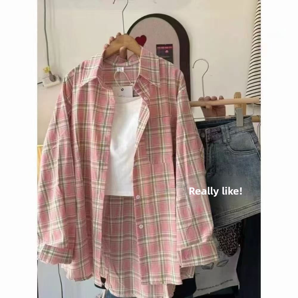 A woman in a blue checkered shirt
