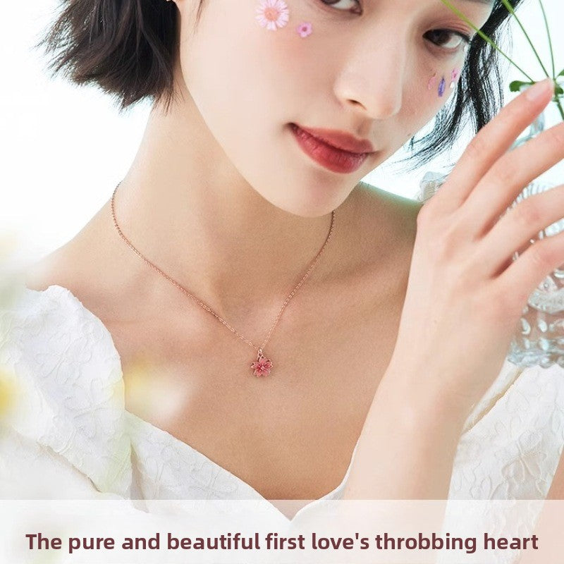 Rotating Peach Blossom Pendant Necklace