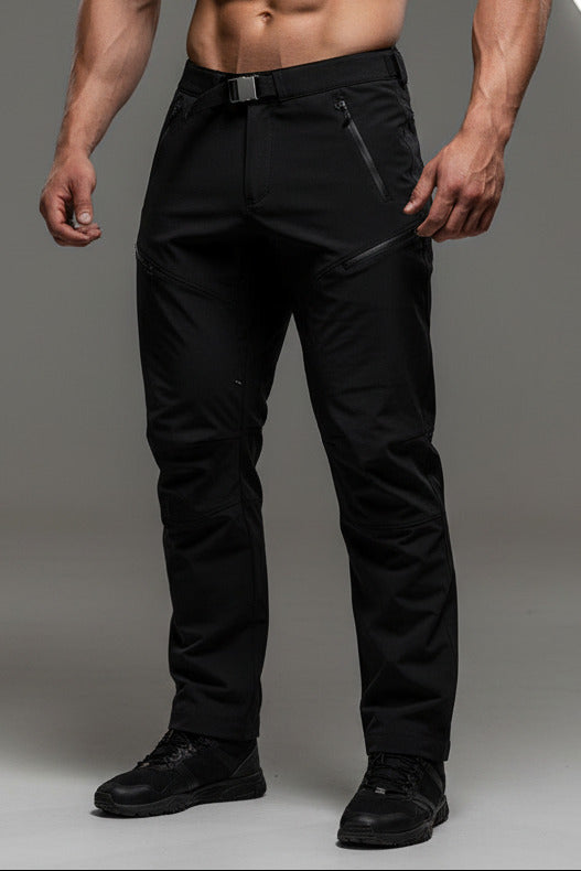 Black technical outdoor pants with zippered pockets and a drawstring waist, shown flat against a white background.