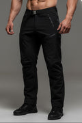 Black technical outdoor pants with zippered pockets and a drawstring waist, shown flat against a white background.