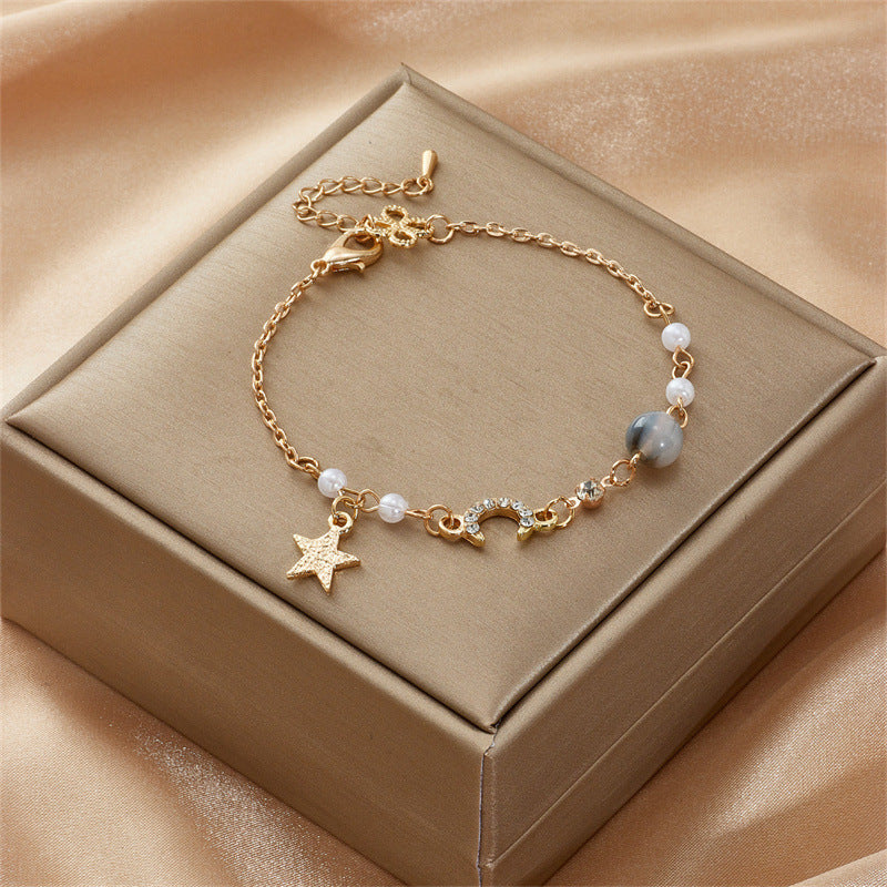 Celestial Charm Bracelet with Pearl Accents in Gold Tone
