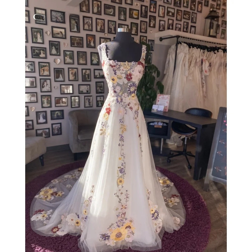 Floral Embroidered Evening Gown with Slit and Sheer Long Sleeves