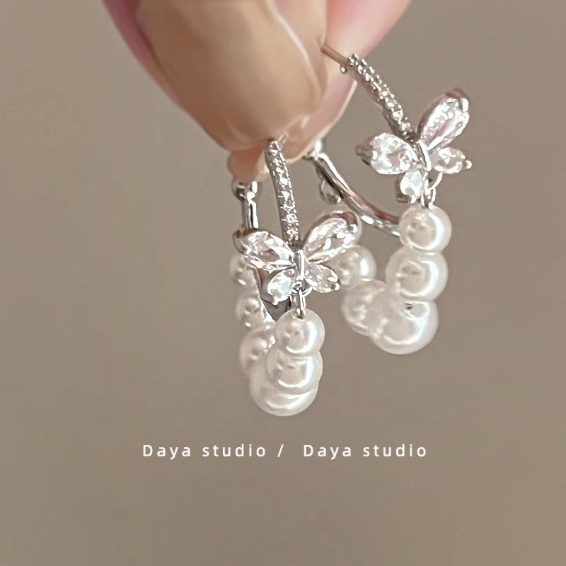 Lirio Charm Bow & Butterfly Earrings