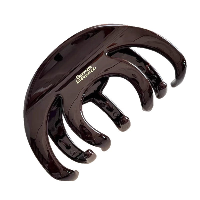Shark clip for the back of the head