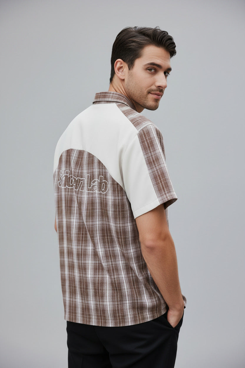 Plaid shirt with white sleeves and brown plaid pattern on a white background, featuring the brand 'SkeenLab'.