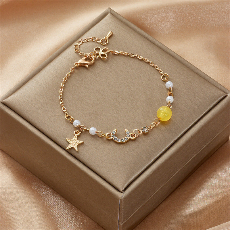Celestial Charm Bracelet with Pearl Accents in Gold Tone