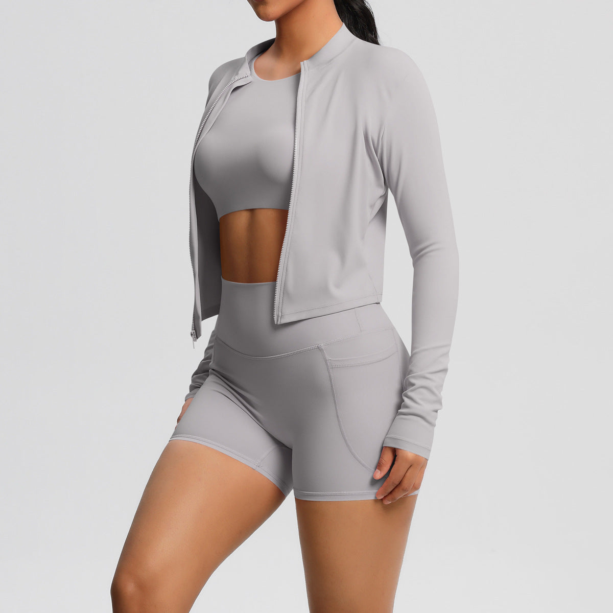 Three-Piece Yoga Set: Cropped Jacket, Sports Bra, and Pocket Shorts