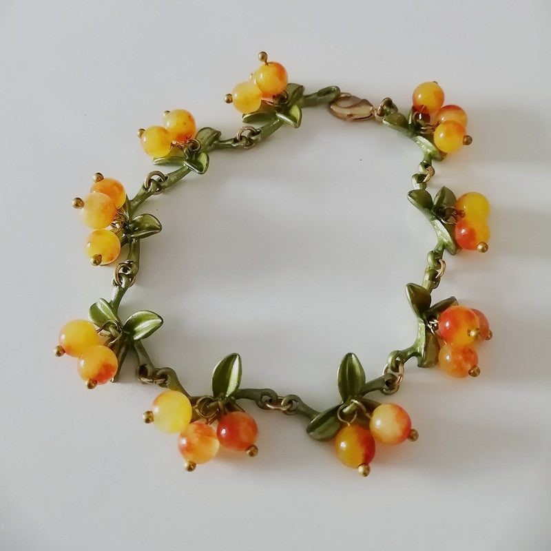 Vintage Floral Pearl Bracelet with Berry Accents