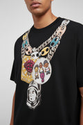 Black t-shirt with a colorful chain necklace on a white background