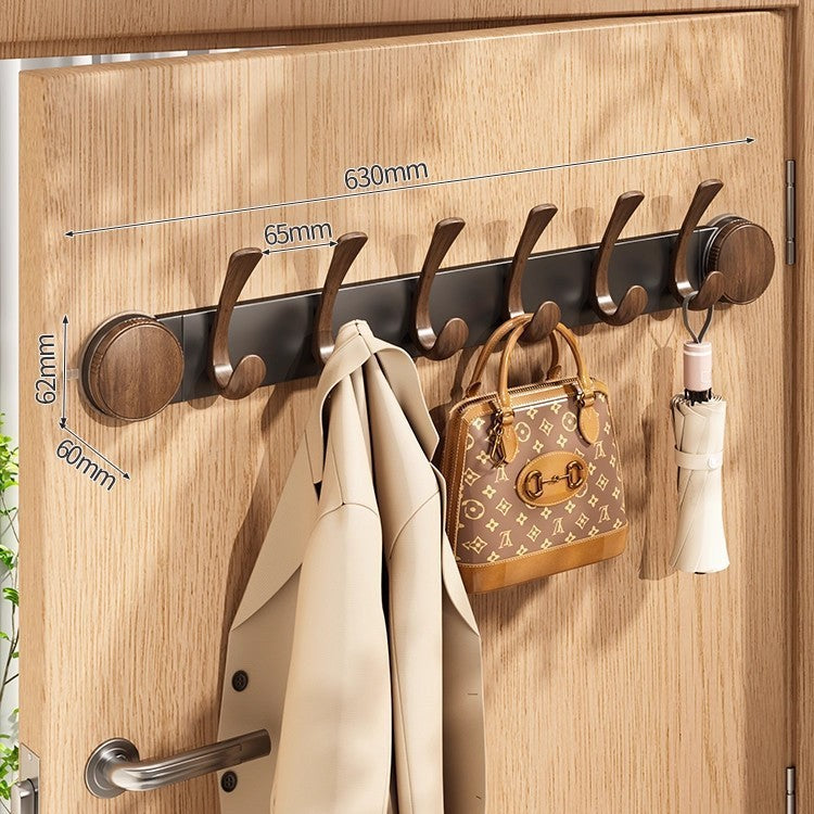 Rotating suction cup walnut hook
